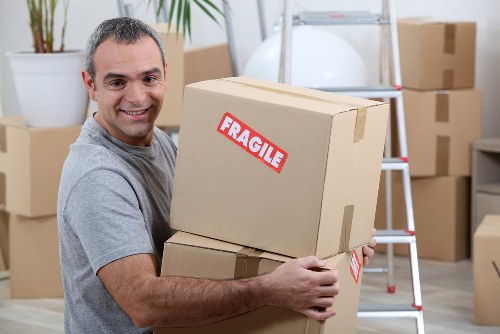 Removal team helping with a home move in Highams Park