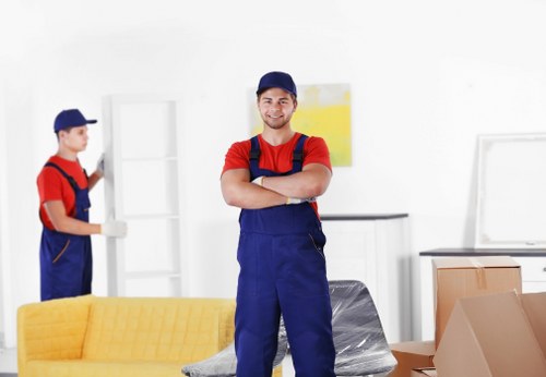 Removal team packing and loading household items