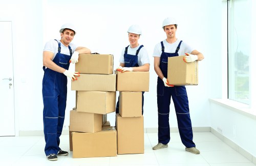 Removal van and moving team prepared for a house move in Highams Park