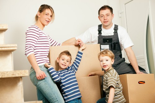 Removals crew loading items for a move in Highams Park