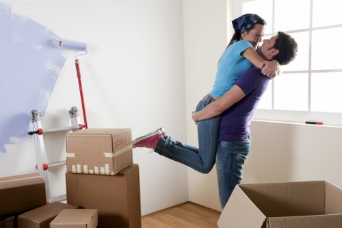 Staff using safe handling methods during a removal