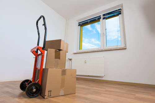 Local team collecting a sofa from a residential property in Highams Park