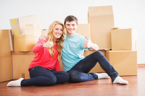 Packed office boxes and equipment ready for relocation in Highams Park